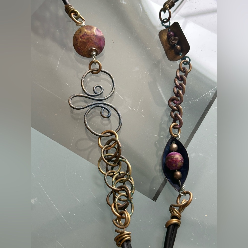 Eyeglass holder elegant metal leather